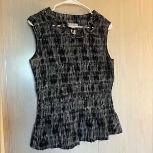 Black & white Fred David sleeveless top. Brand new condition. Size p/lrg